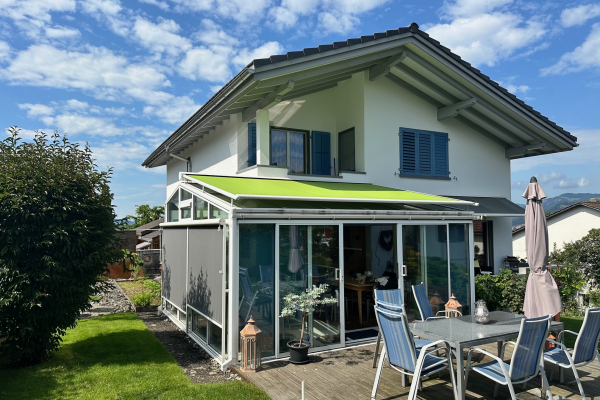 fassade-su-d-west-mit-wintergarten-29B89F373-E124-16F3-A8A2-94B34E59B3F7.jpg